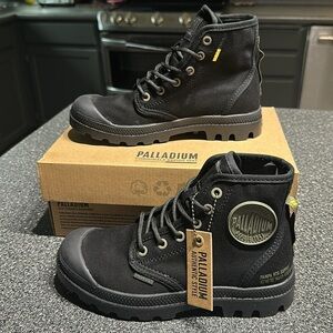Brand new Palladium high top boot in women’s size 5.5 or men’s size 4